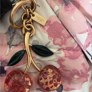 Coach Cherry Keychain with Gold and Red Accents